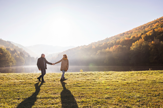 Couple on a walk together on a beautiful fall day